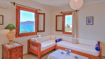 Suite Supérieure, 2 chambres, vue mer | Coin séjour