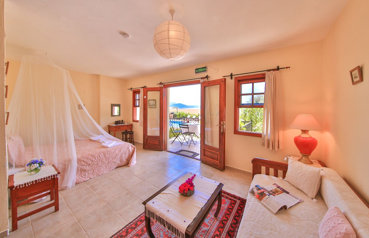 junior suite, 1 bedroom, garden view | 1 bedroom, premium bedding, minibar, desk