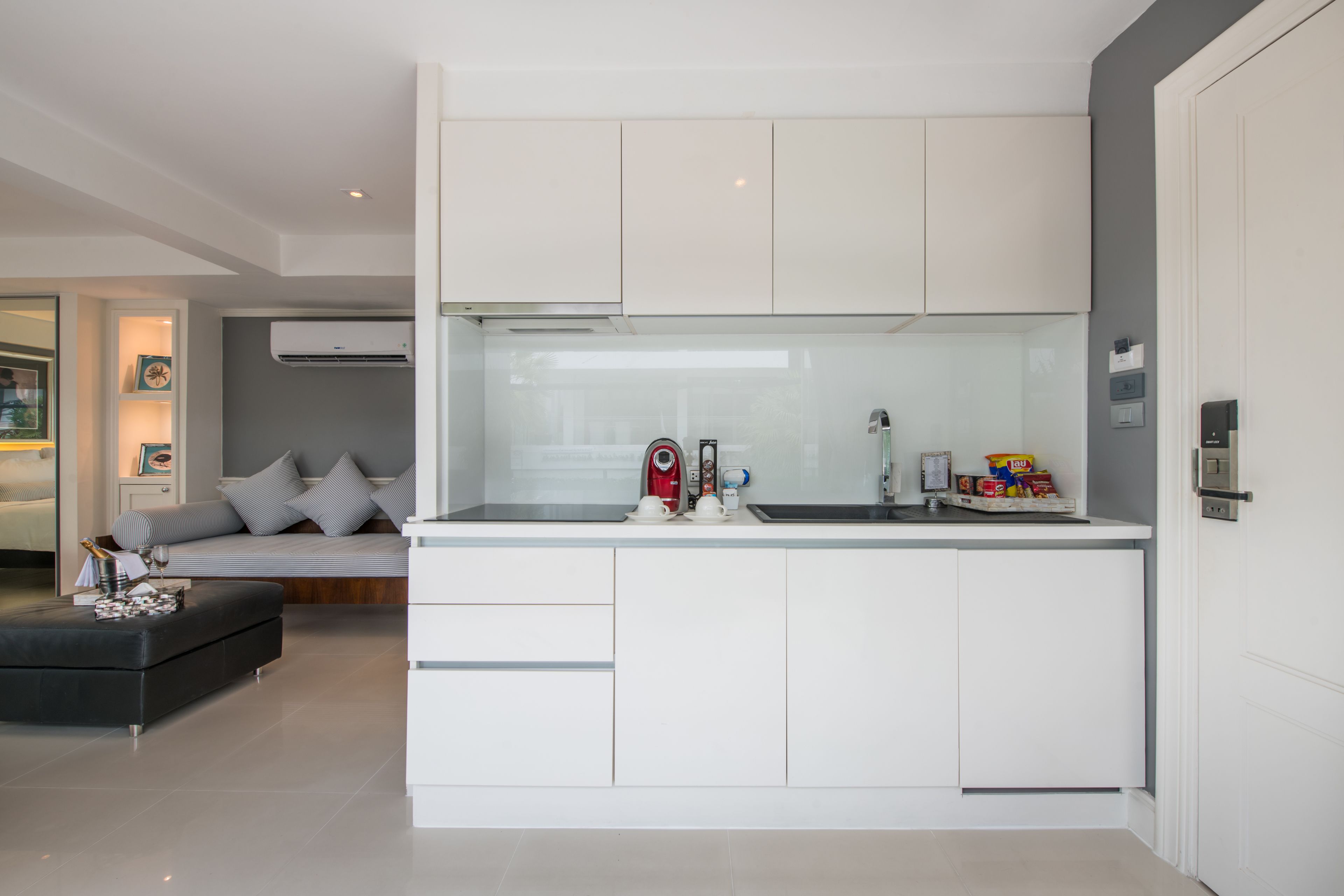 full-sized fridge, microwave, stovetop, espresso maker