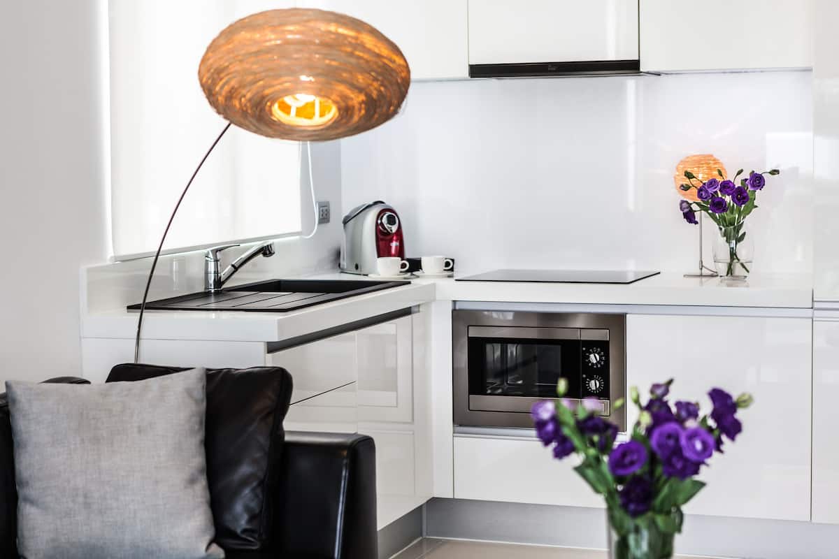 full-sized fridge, microwave, stovetop, espresso maker