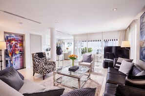 Presidential Room | Living area | 46-inch flat-screen TV with satellite channels, TV - BYD Lofts Boutique Hotel & Serviced Apartments - Patong Beach, Phuket (Patong)