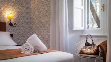 Premium bedding, down duvets, minibar, in-room safe