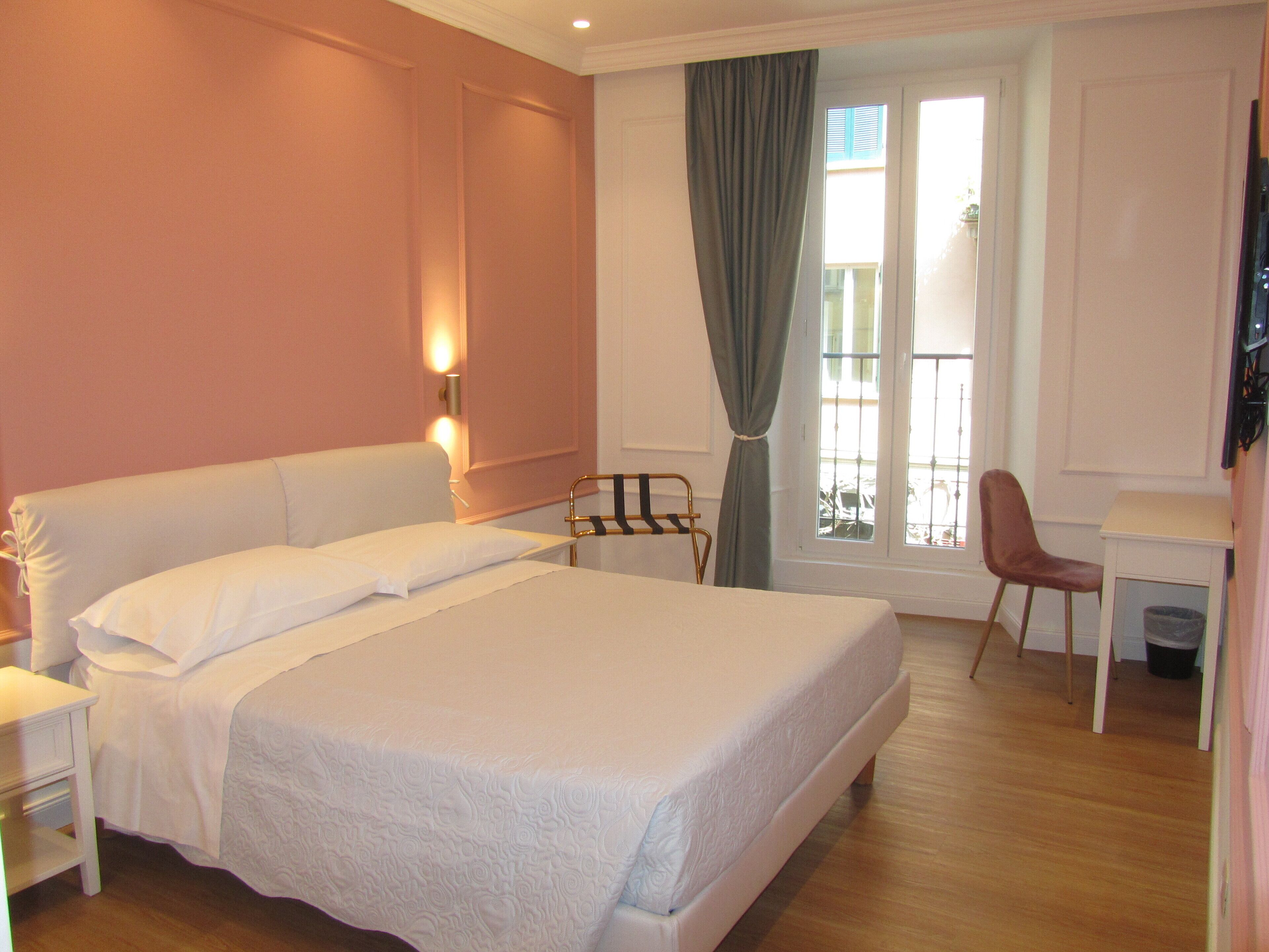 superior double room | in-room safe, individually decorated, desk, laptop workspace