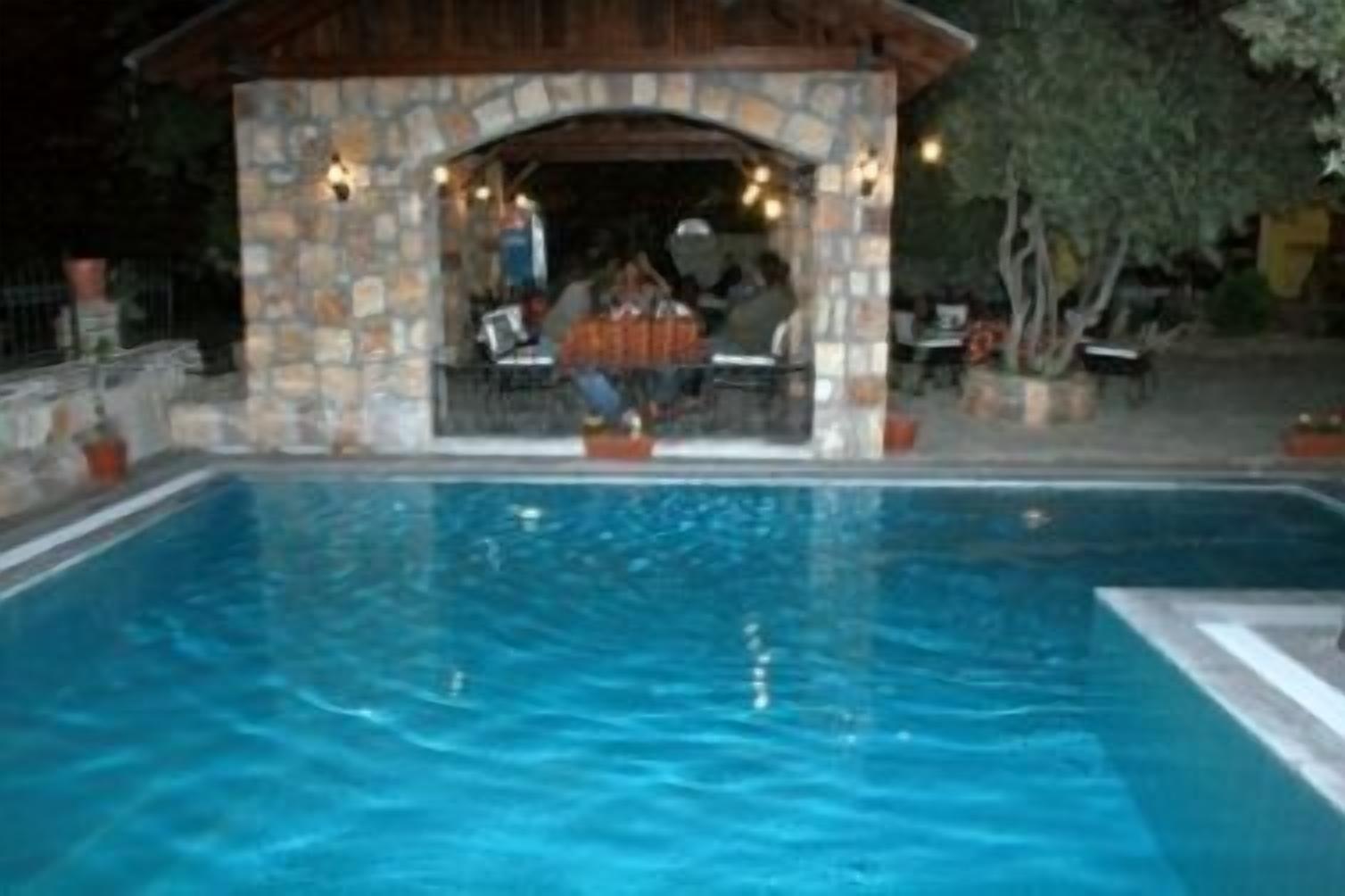 seasonal outdoor pool, pool umbrellas, pool loungers