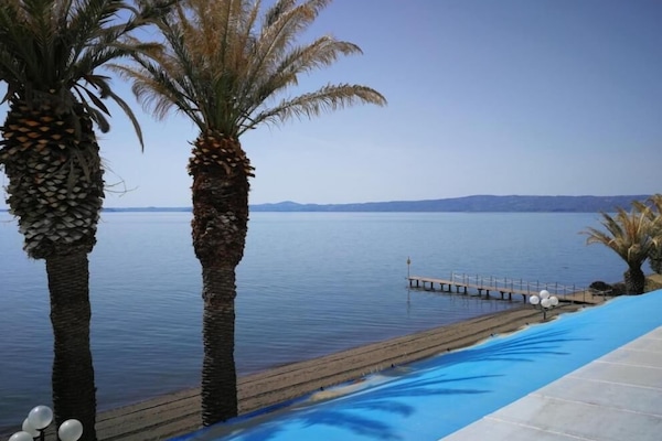 Seasonal outdoor pool, pool umbrellas, sun loungers