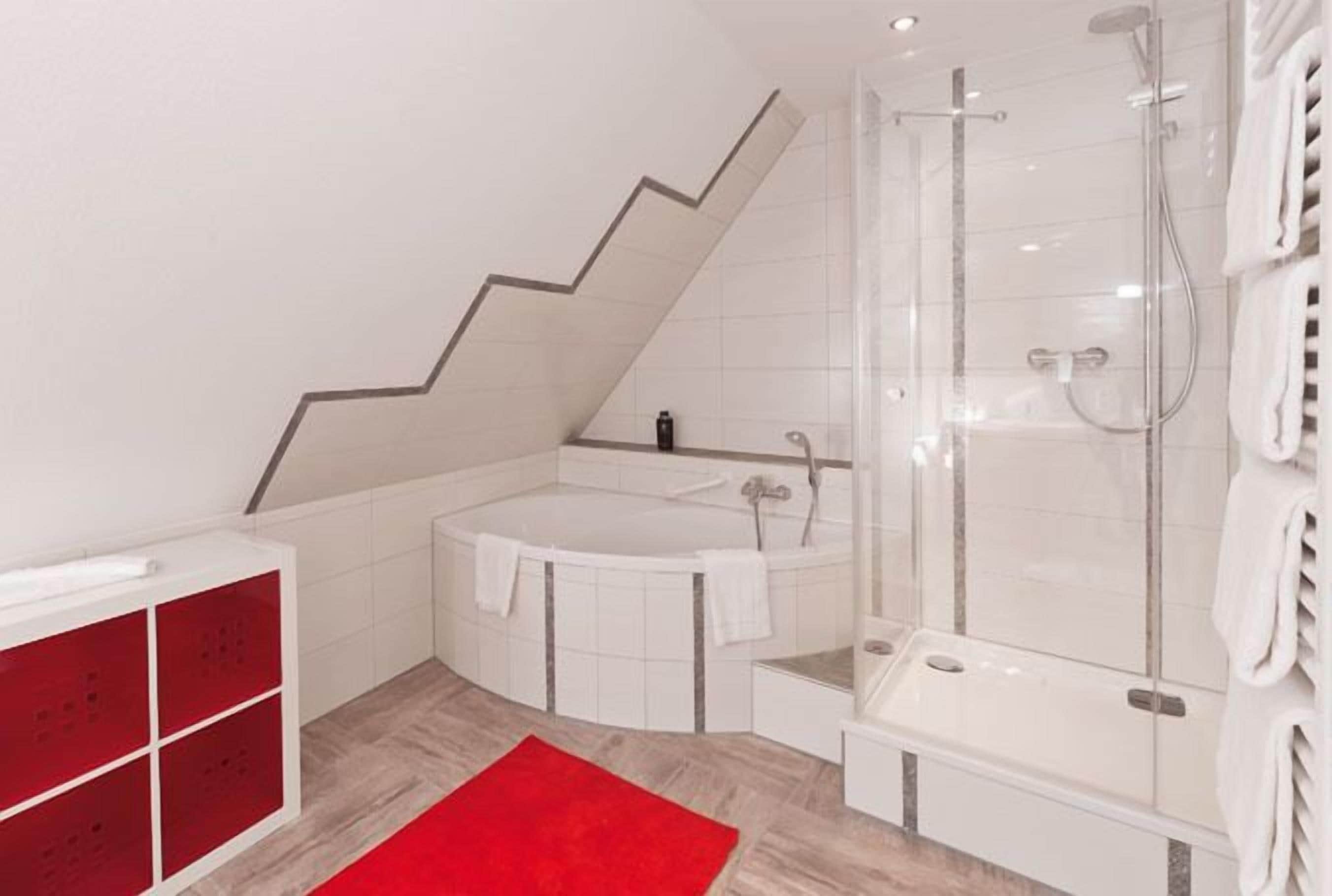superior apartment | bathroom | bathtub, free toiletries, hair dryer, towels