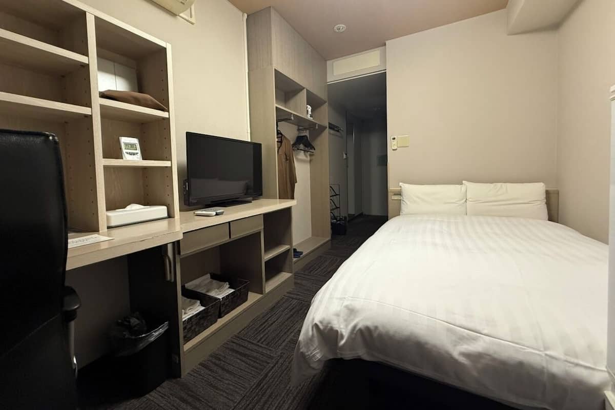 Premium bedding, down comforters, blackout drapes, free WiFi