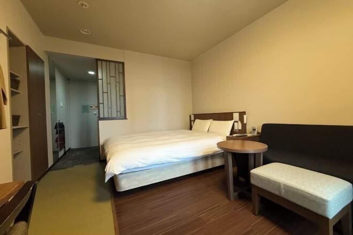 Premium bedding, down comforters, blackout drapes, free WiFi