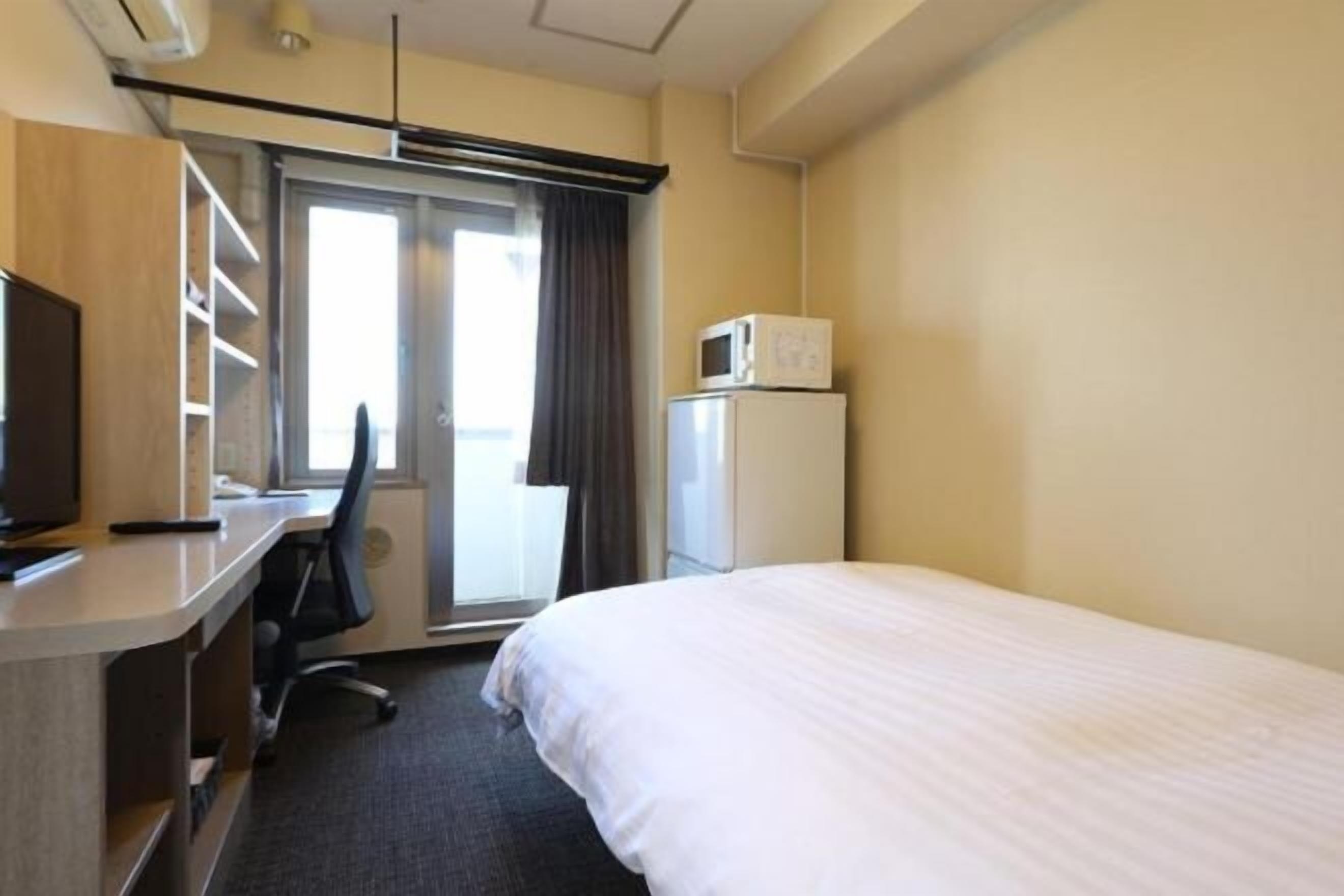 Premium bedding, down duvets, blackout curtains, free WiFi