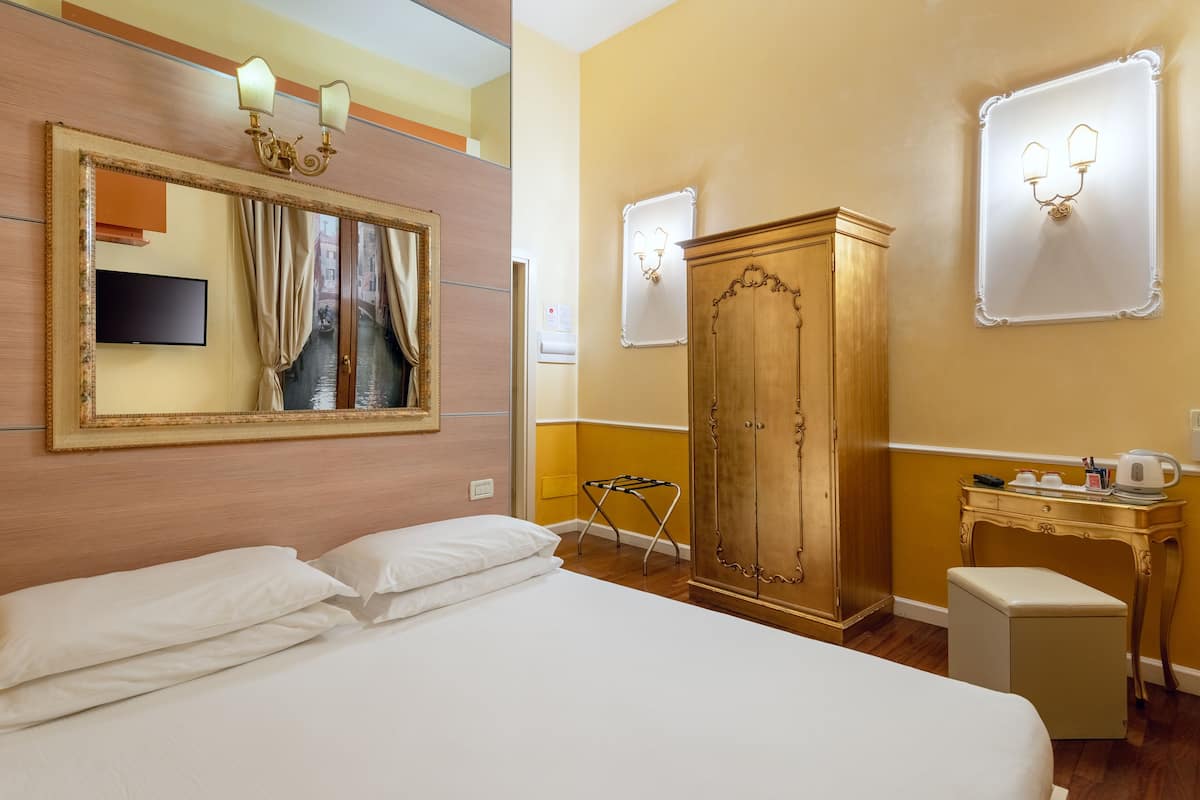 Classic Double Room | Down comforters, minibar, in-room safe, individually decorated