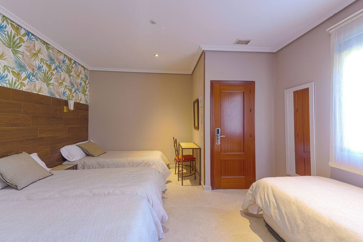 Family Room | Select Comfort beds, desk, WiFi (free)