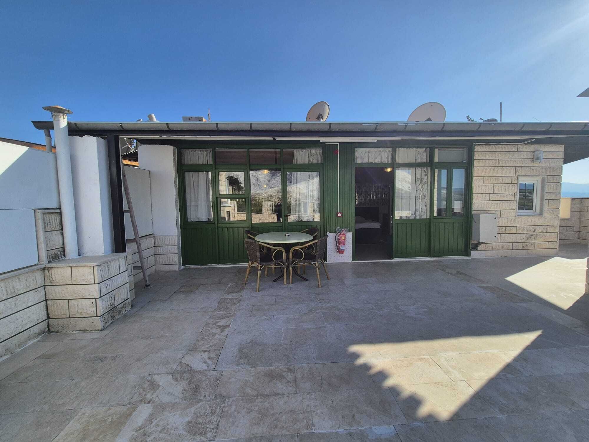 panoramic quadruple room, multiple beds, terrace, poolside | terrace/patio