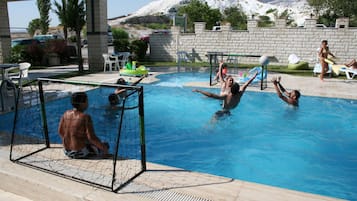 Outdoor pool, pool umbrellas, sun loungers