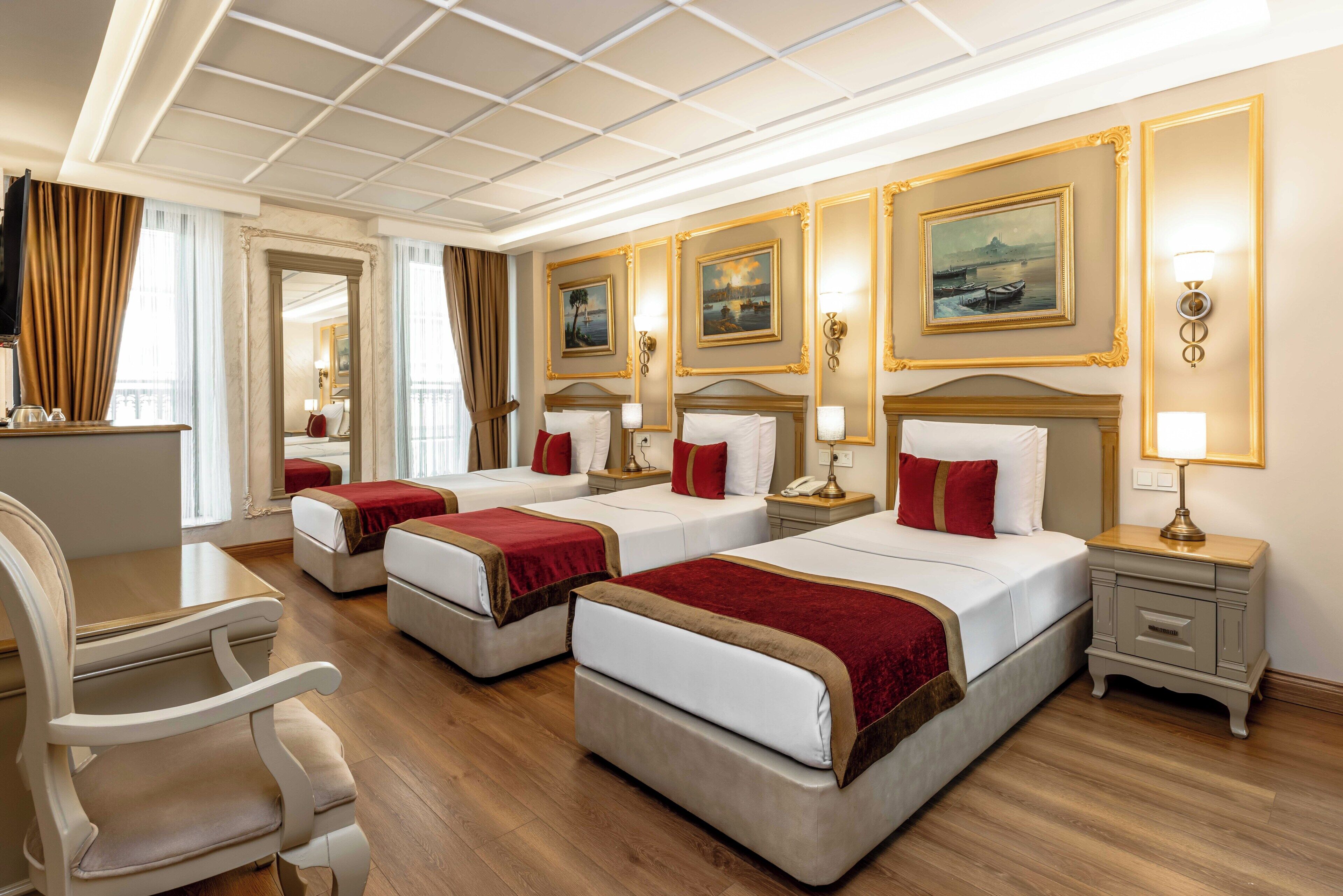Chambre Triple Deluxe | Literie de qualité supérieure, minibar, coffres-forts dans les chambres