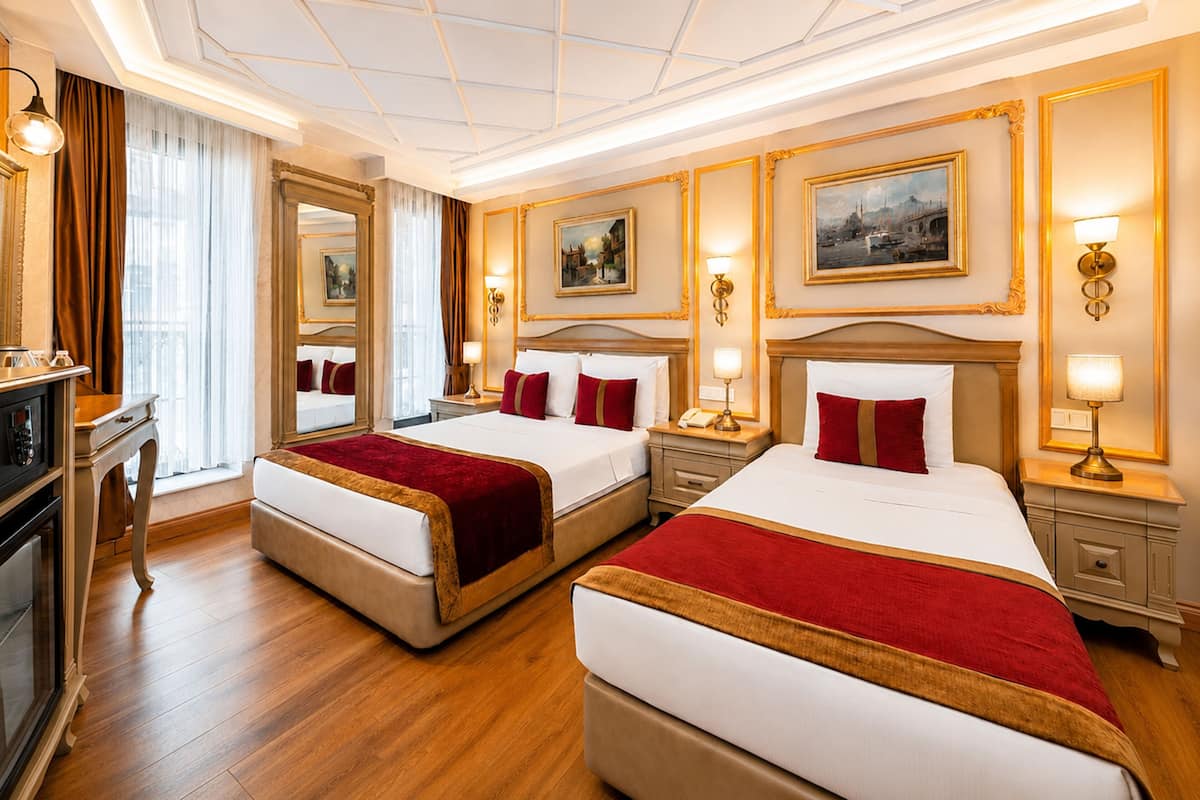 Deluxe Triple Room | Premium bedding, minibar, in-room safe, desk