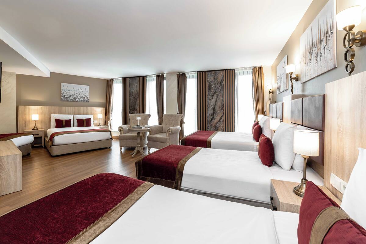 Suíte superior | Roupas de cama premium, frigobar, cofres nos quartos, escrivaninha
