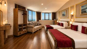 Deluxe Quadruple Room | Premium bedding, minibar, in-room safe, desk