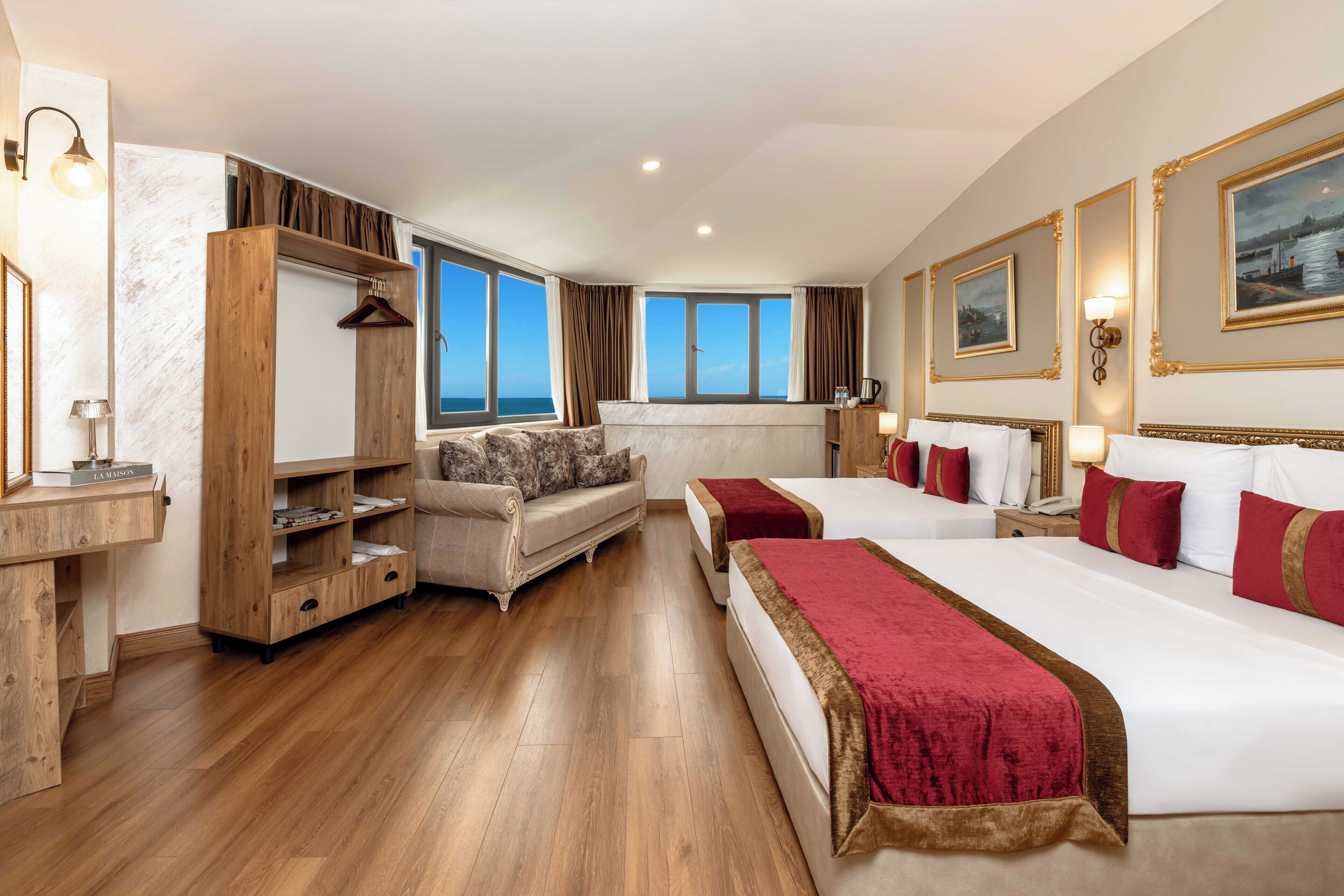 Chambre Quadruple Deluxe | Literie de qualité supérieure, minibar, coffres-forts dans les chambres