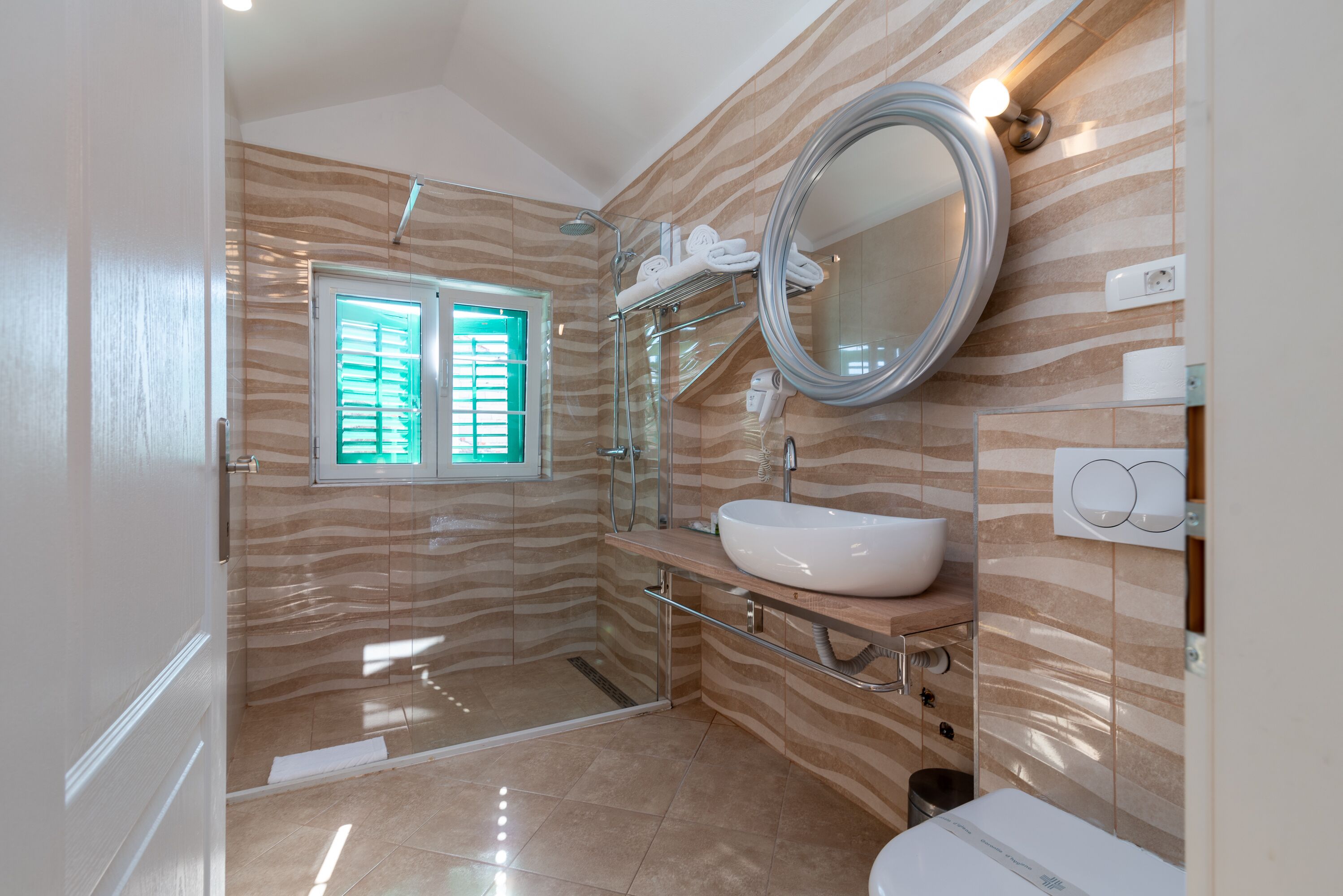 standard double room | minibar, in-room safe, individually decorated, blackout curtains