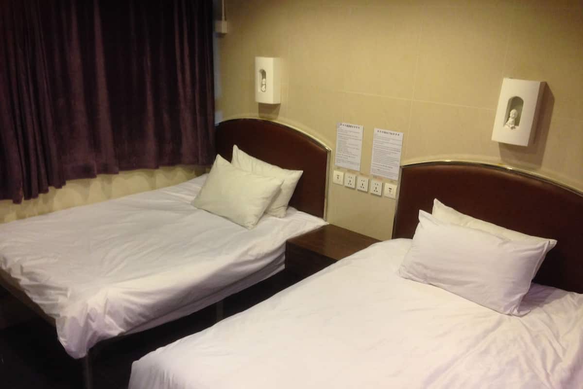 Hypo-allergenic bedding, blackout drapes, soundproofing, free WiFi
