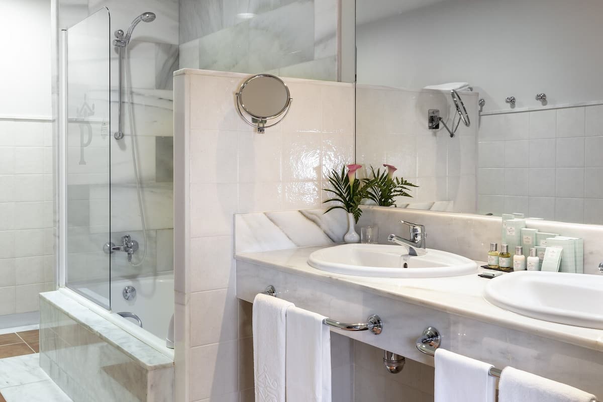 superior double room | bathroom | eco-friendly toiletries, hair dryer, bidet, towels