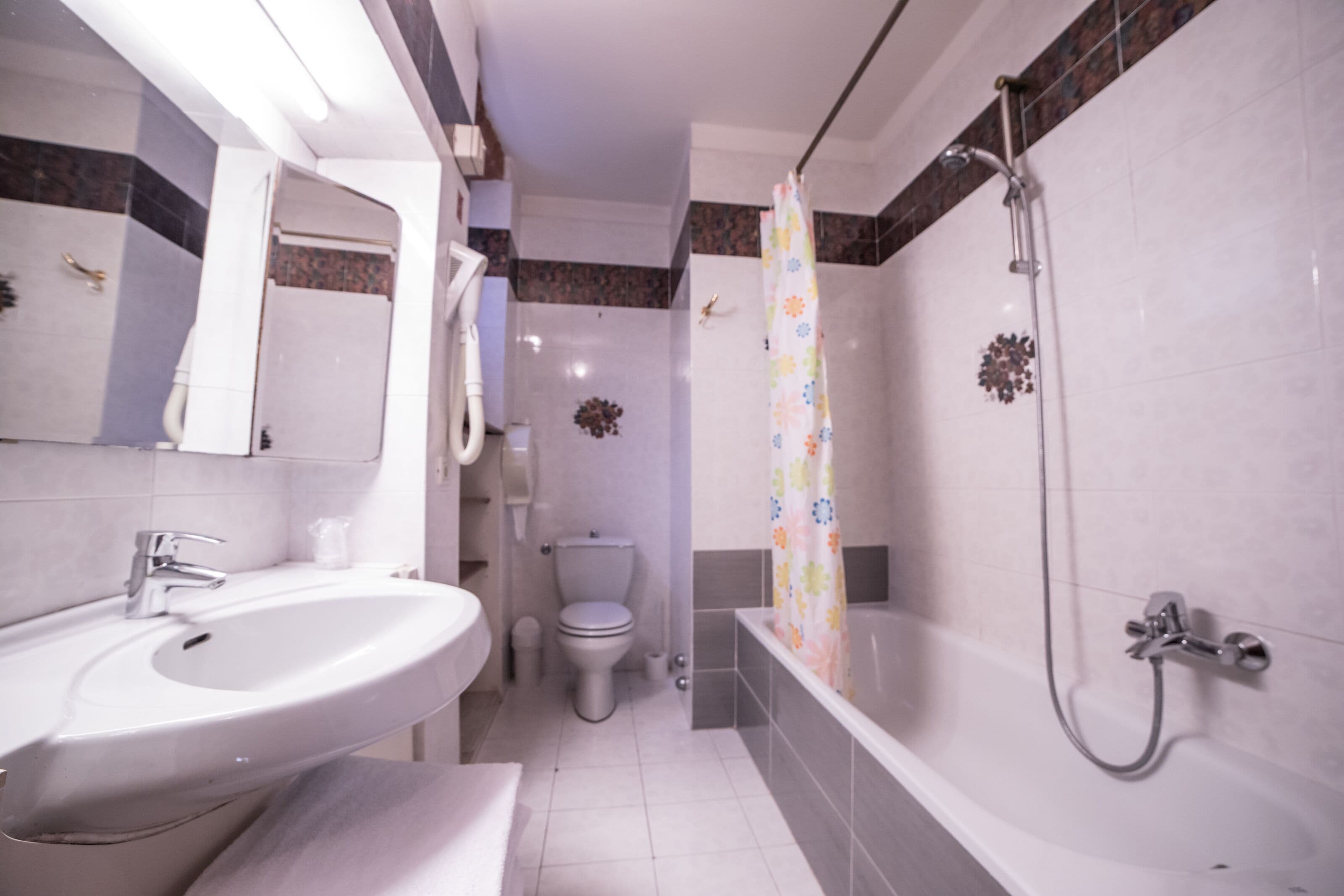 family room | bathroom | rainfall showerhead, free toiletries, hair dryer, towels