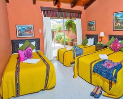 Standard Triple Room, Private Bathroom | In-room safe, individually decorated, individually furnished, desk