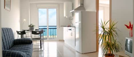 Appartement Standard | Salle de séjour | Télévision