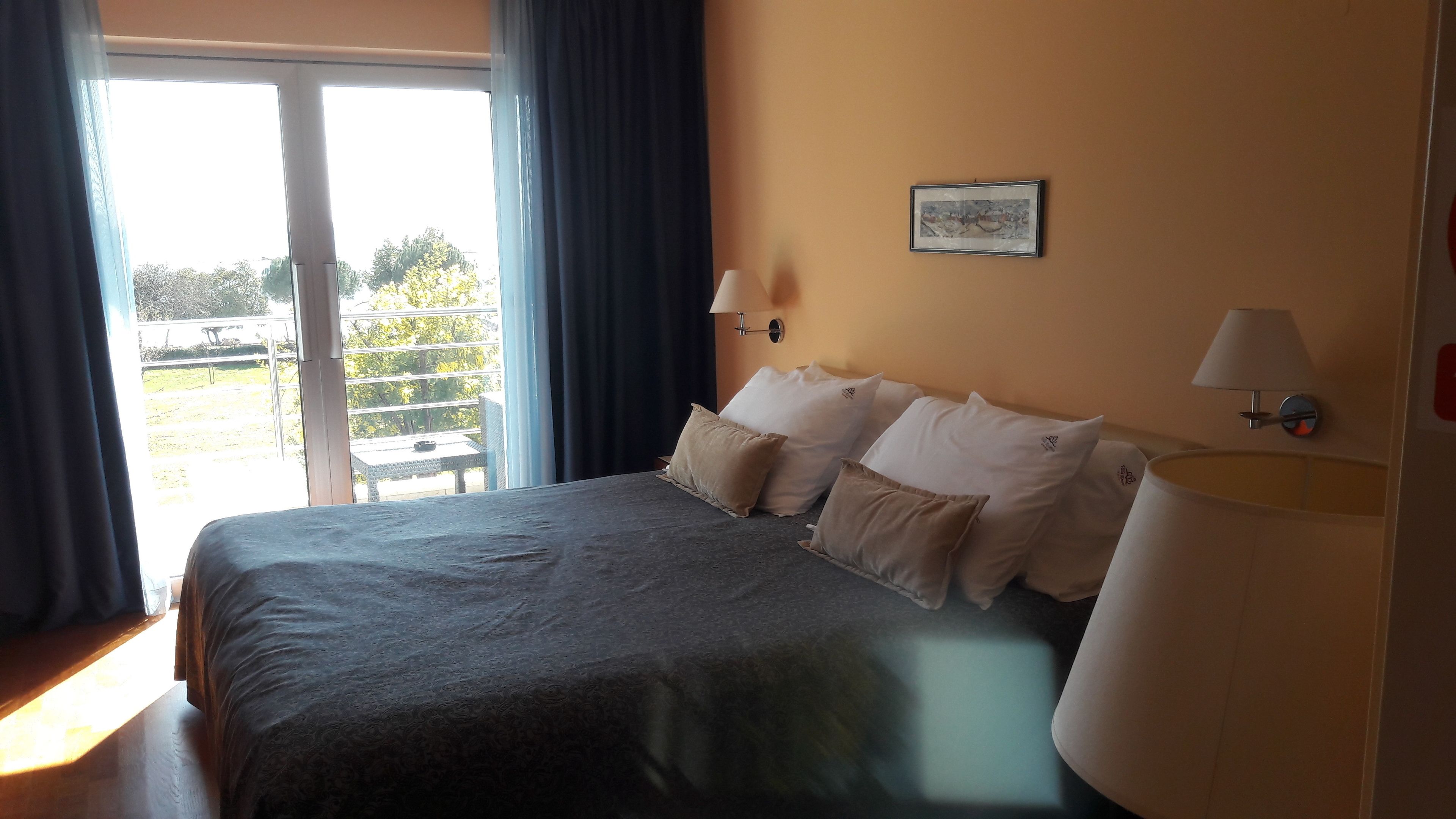 superior double room, balcony, sea view | premium bedding, minibar, in-room safe, desk