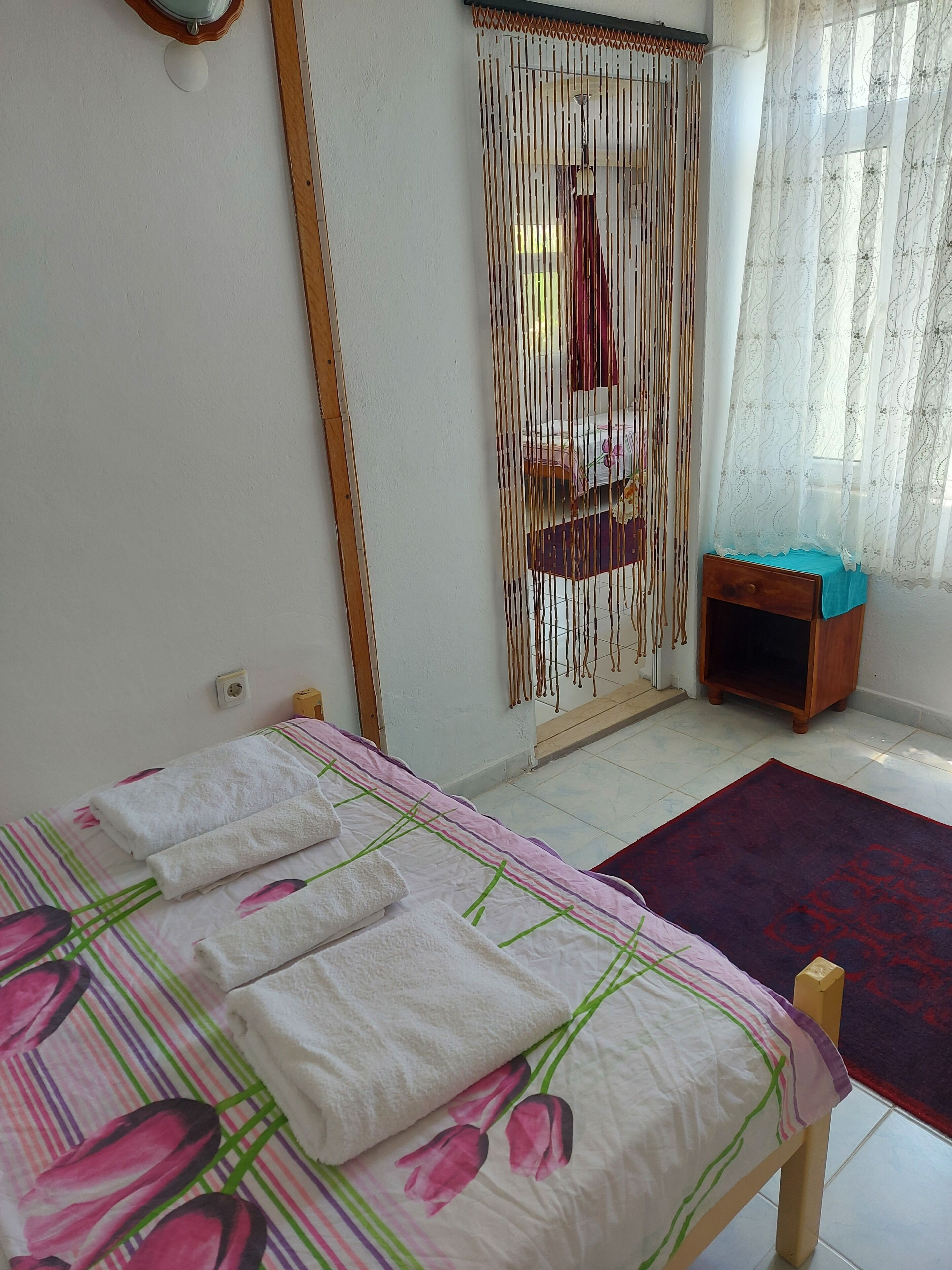 Family Quadruple Room, 2 Bedrooms | In-room safe, desk, free WiFi