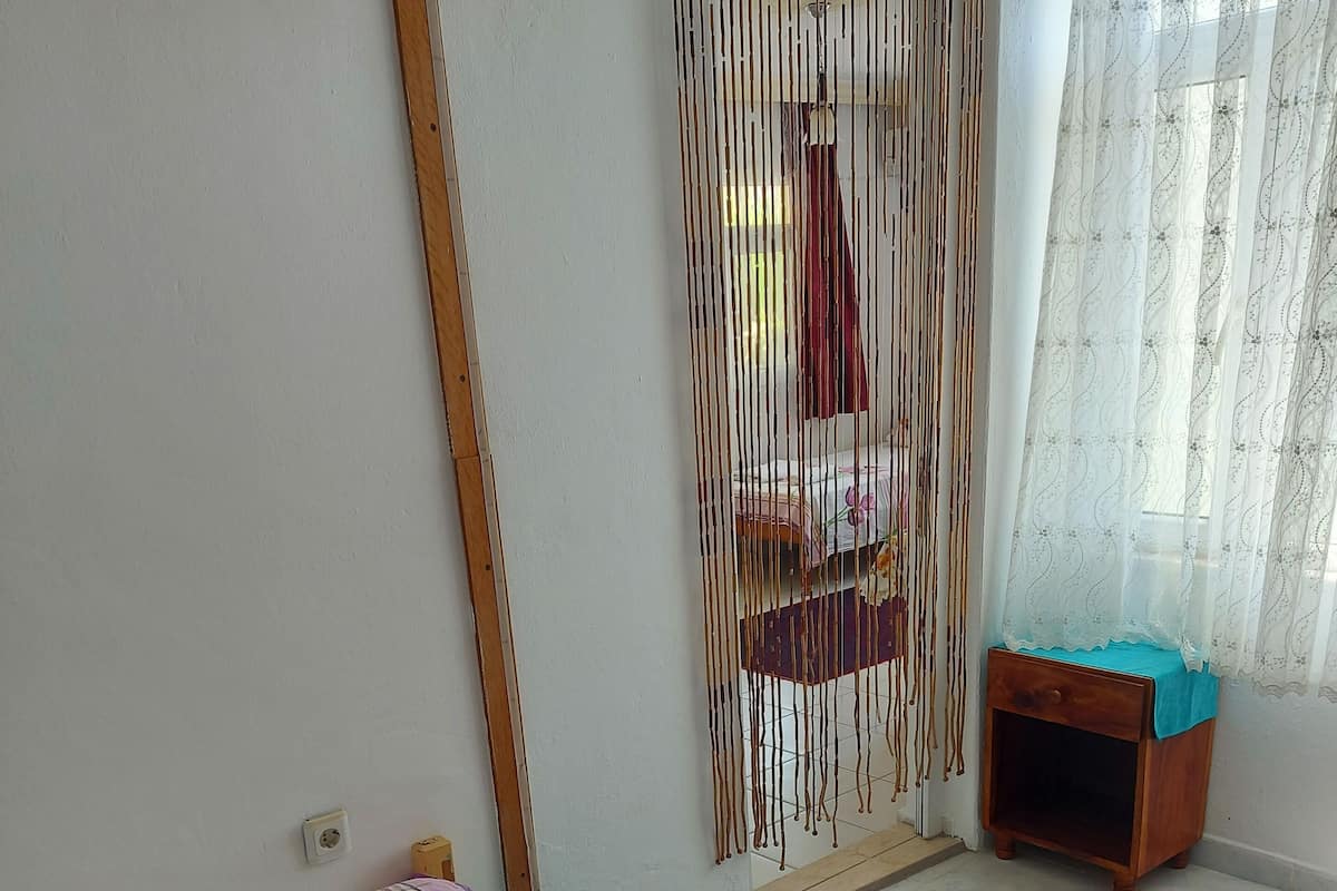 Family Quadruple Room, 2 Bedrooms | In-room safe, desk, free WiFi