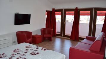 Superior Suite, 1 Bedroom, Terrace | In-room safe, desk, iron/ironing board, cribs/infant beds