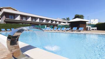 Seasonal outdoor pool, open 10:00 AM to 7:00 PM, sun loungers