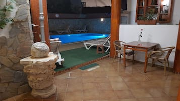 Seasonal outdoor pool, pool umbrellas, pool loungers