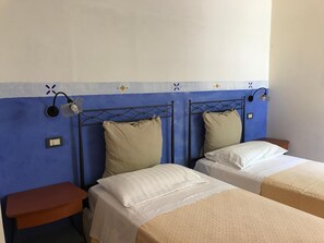 2 bedrooms, individually decorated, individually furnished, desk