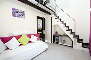 Premium bedding, down duvets, memory-foam beds, free minibar items