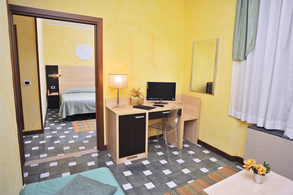 Family Quadruple Room | Minibar, in-room safe, free WiFi