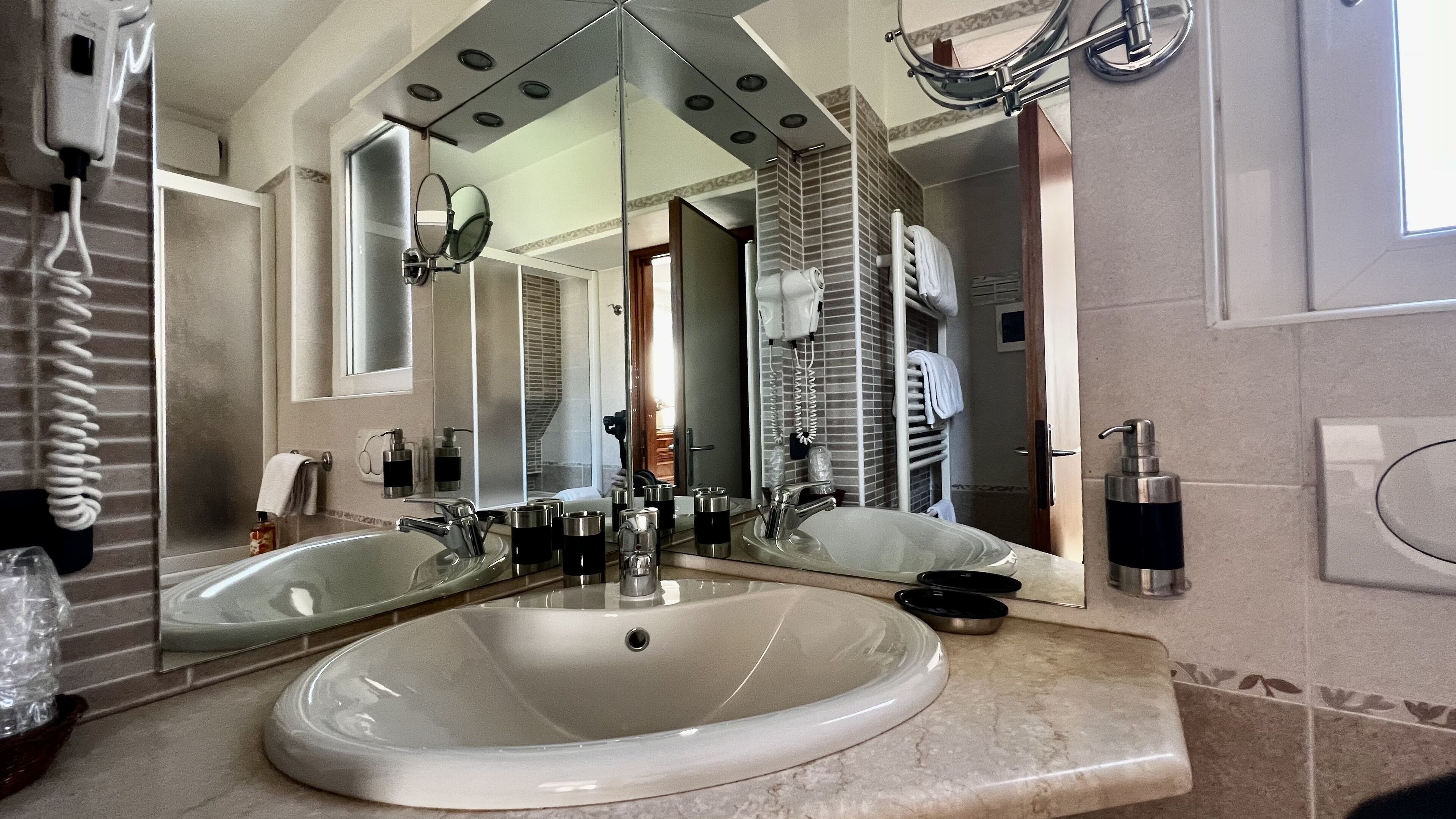 family room | bathroom | combined shower/bathtub, rainfall showerhead, hair dryer, bidet