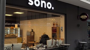 A storefront with a sign reading 'sono.' and a sign for 'Costa Coffee' to the right. - Hotel am Augustinerplatz (Cologne)