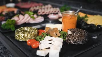 Daily buffet breakfast (EUR 18 per person)