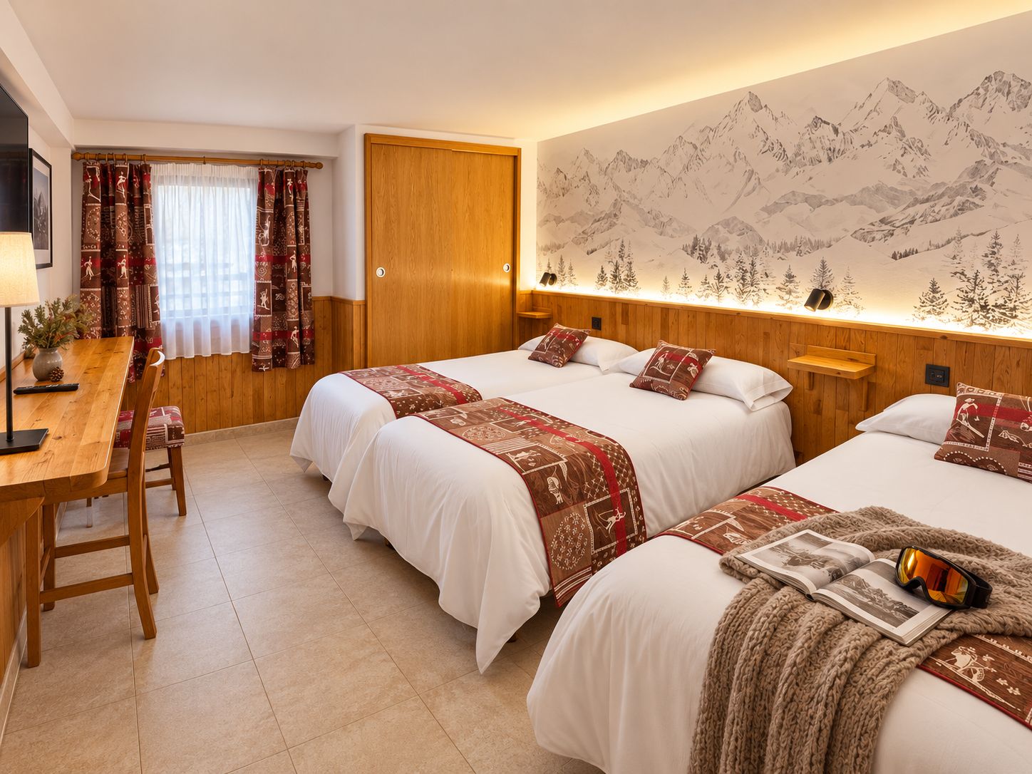Een hotelkamer met twee bedden, een houten bureau en een wand met een berglandschap op een muurschildering.