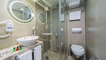 Shower, free toiletries, hair dryer, slippers