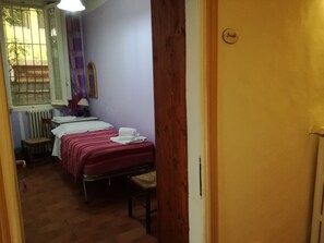 Laptop workspace, blackout drapes, soundproofing, iron/ironing board