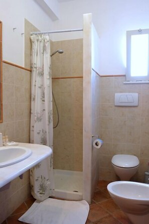 Triple Room | Bathroom amenities | Shower, rainfall showerhead, hair dryer, bathrobes