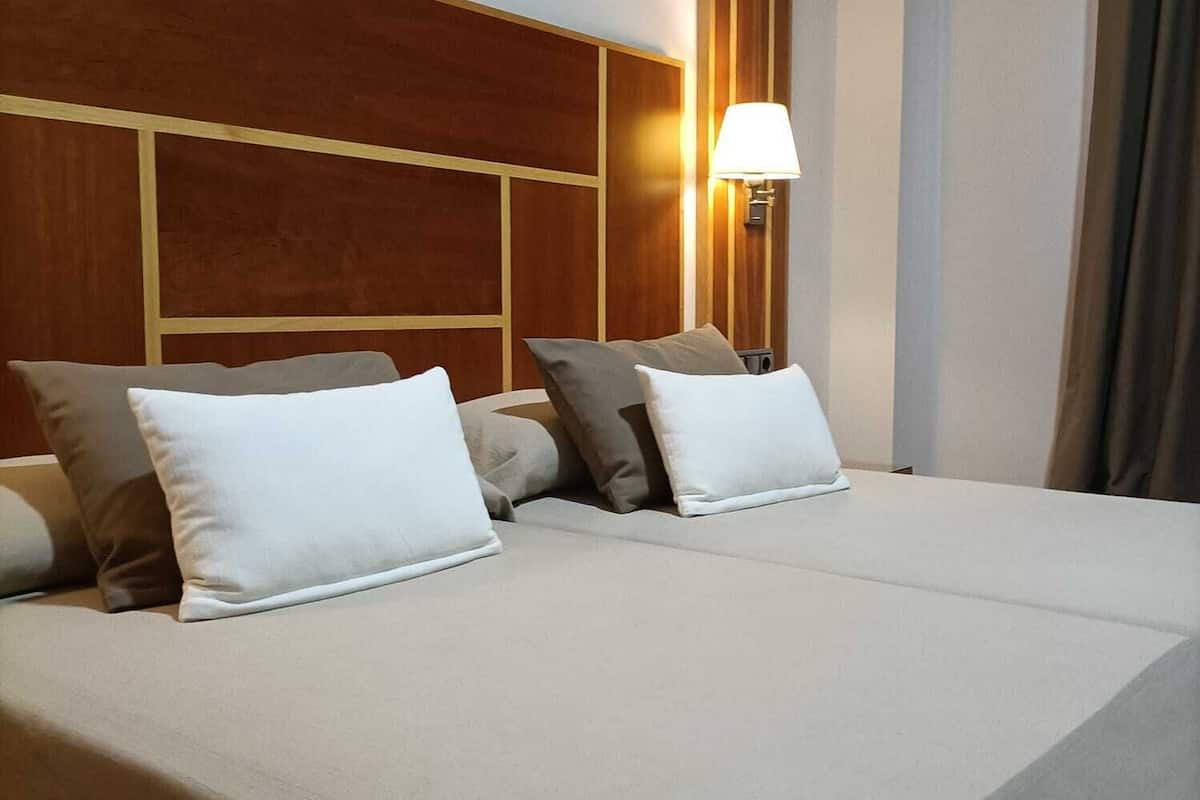 desk, laptop workspace, soundproofing, rollaway beds