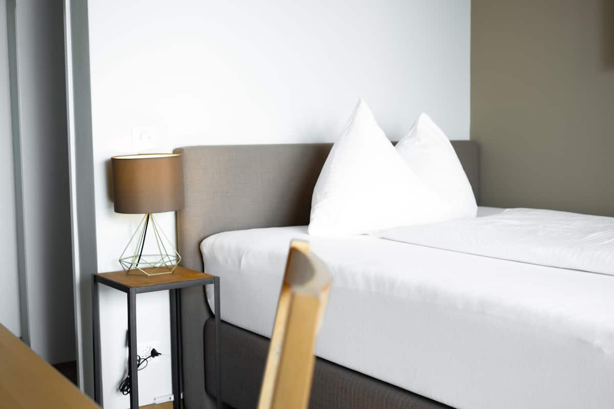 Basic Single Room, 1 Twin Bed, Non Smoking, City View | Living area | 30-inch flat-screen TV with cable channels, TV