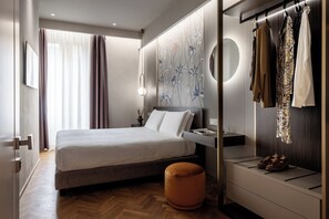 Camera Deluxe con letto matrimoniale o 2 letti singoli | Italiaanse Frette-lakens, luxe beddengoed, een minibar