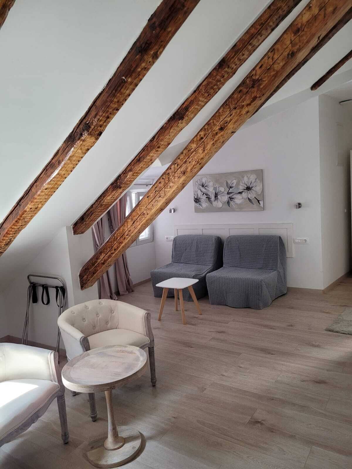 family double room, annex building | living area | 101-cm lcd tv with satellite channels, tv, books