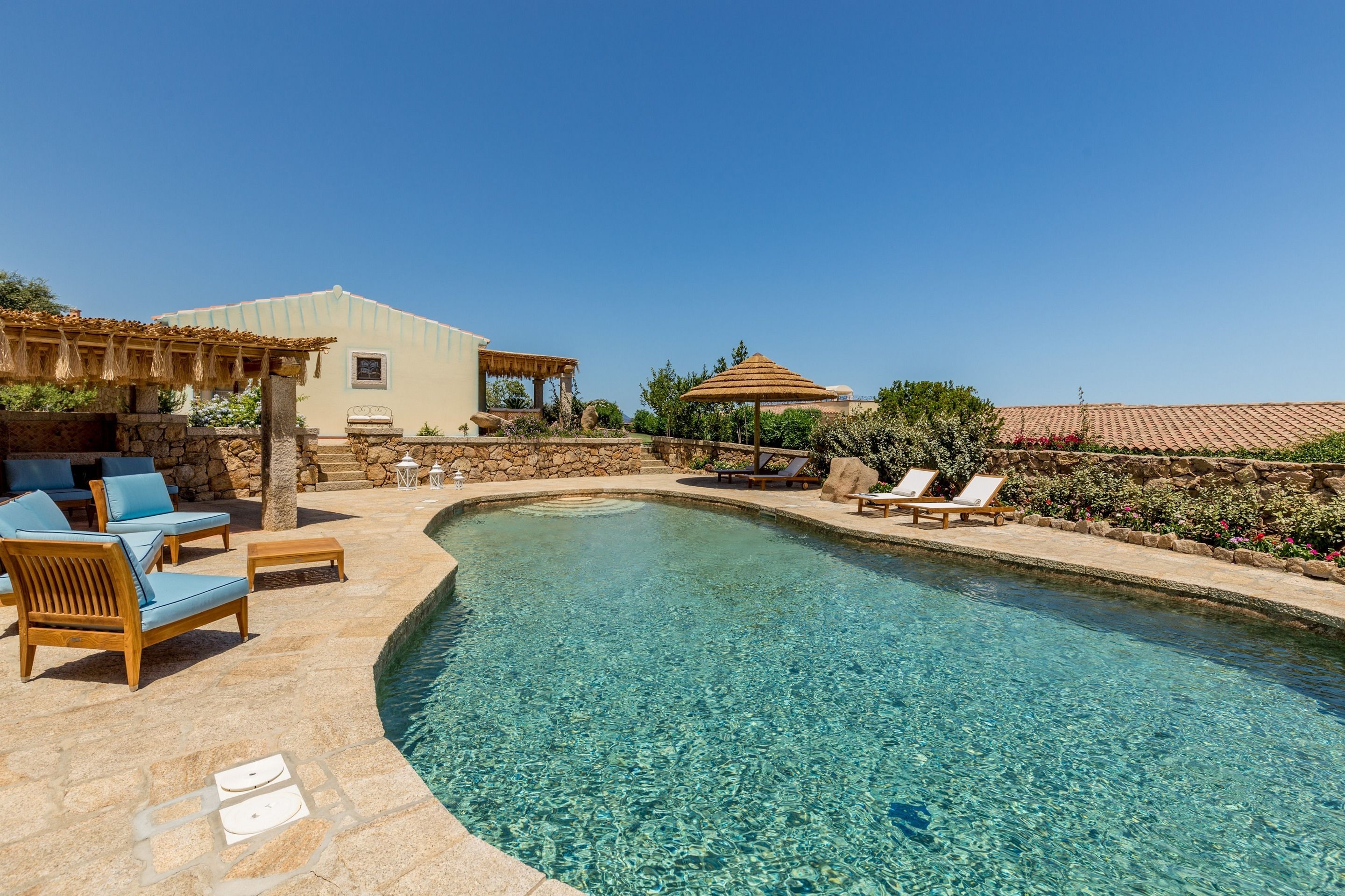 outdoor pool, pool umbrellas, pool loungers