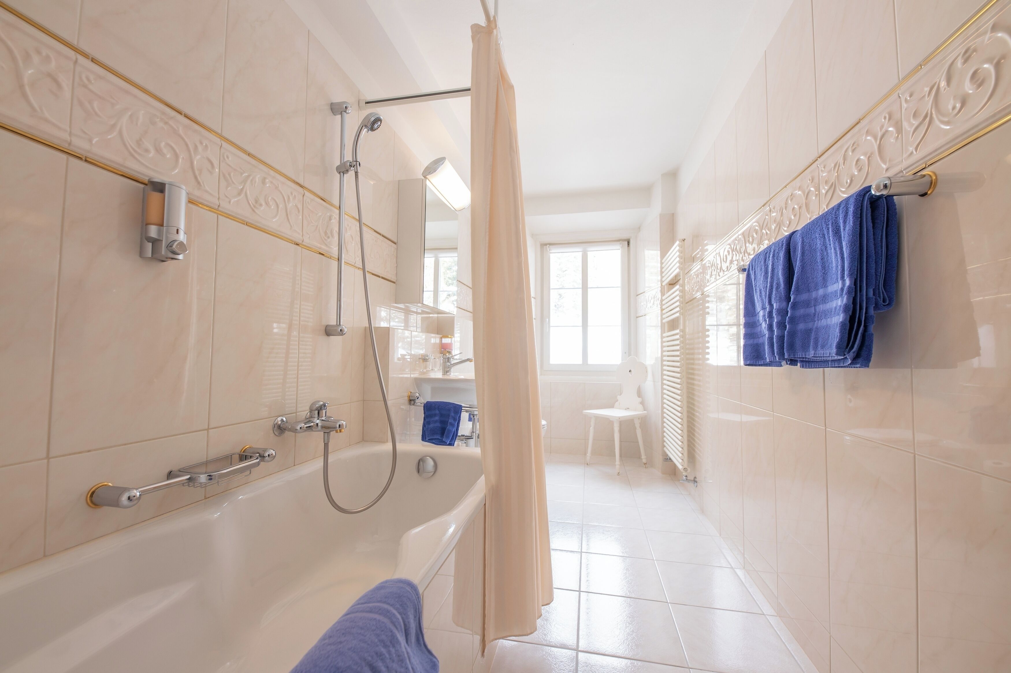 family room (superior) | bathroom | deep-soaking bathtub, hair dryer, towels